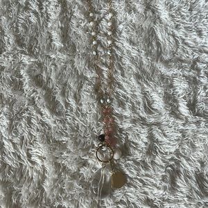 long gold beaded necklace